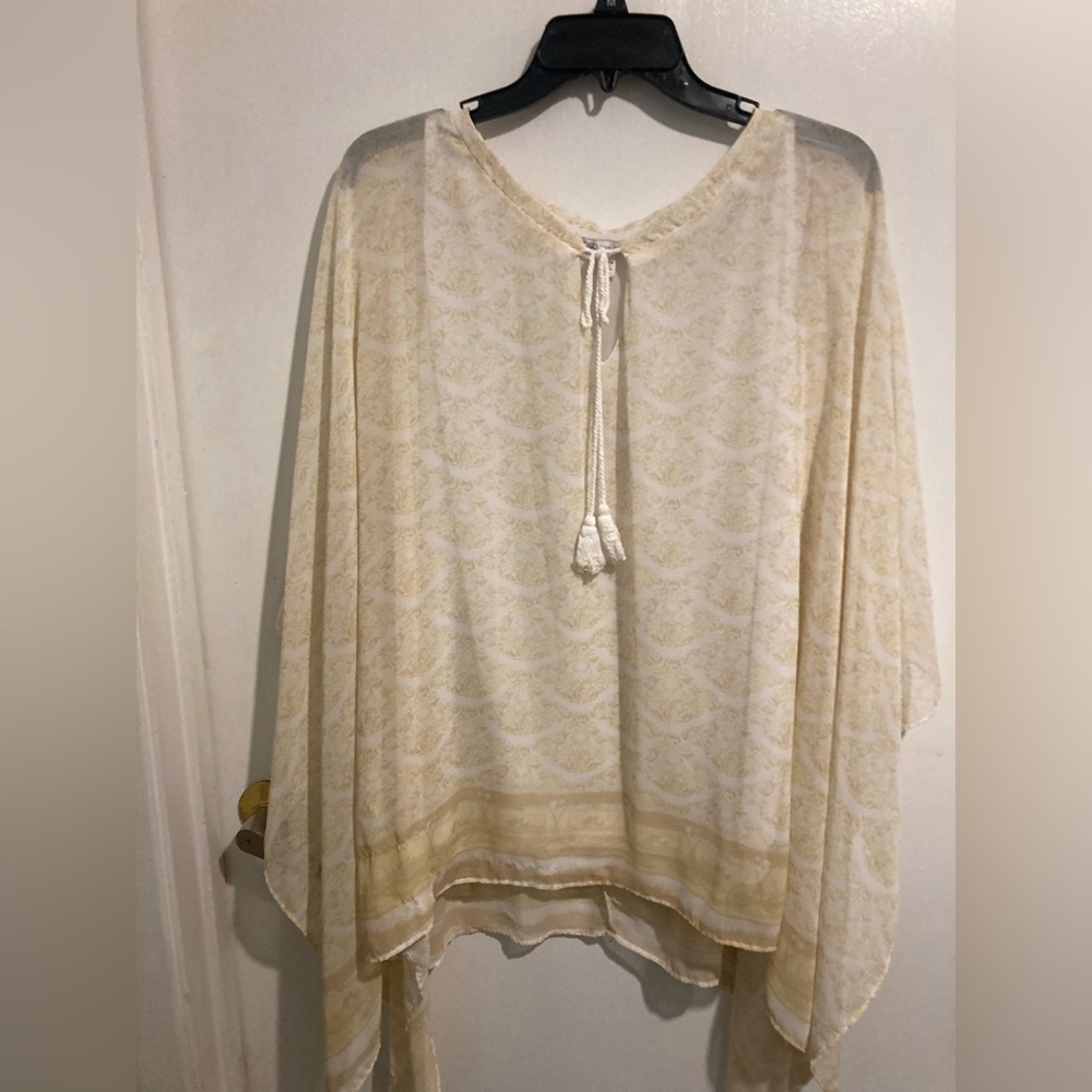 Sheer poncho that comes with slip inside